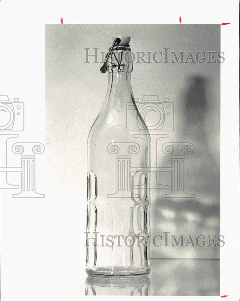 1980 Press Photo Glass Bottle with Hinged Cork - hps10330- Historic Images