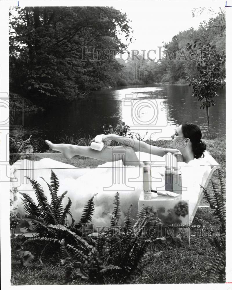 1975 Press Photo Bathing outside listening to sounds of Nature - hps10463- Historic Images