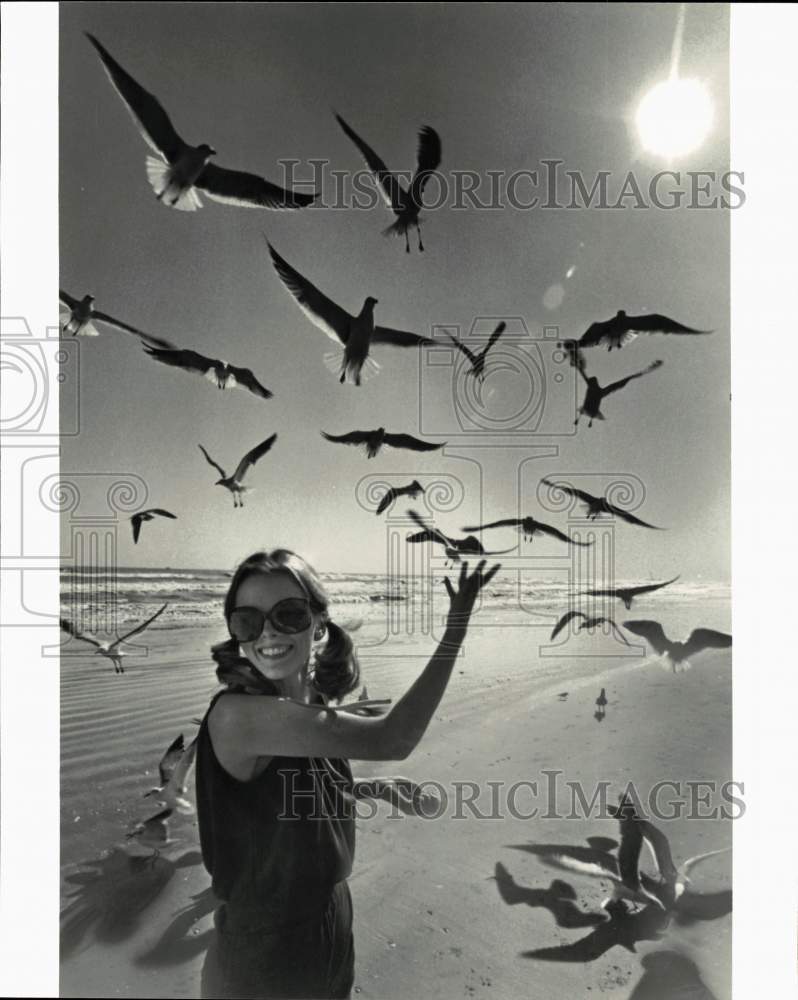 Press Photo Woman with Birds on Beach in Texas - hps10469- Historic Images