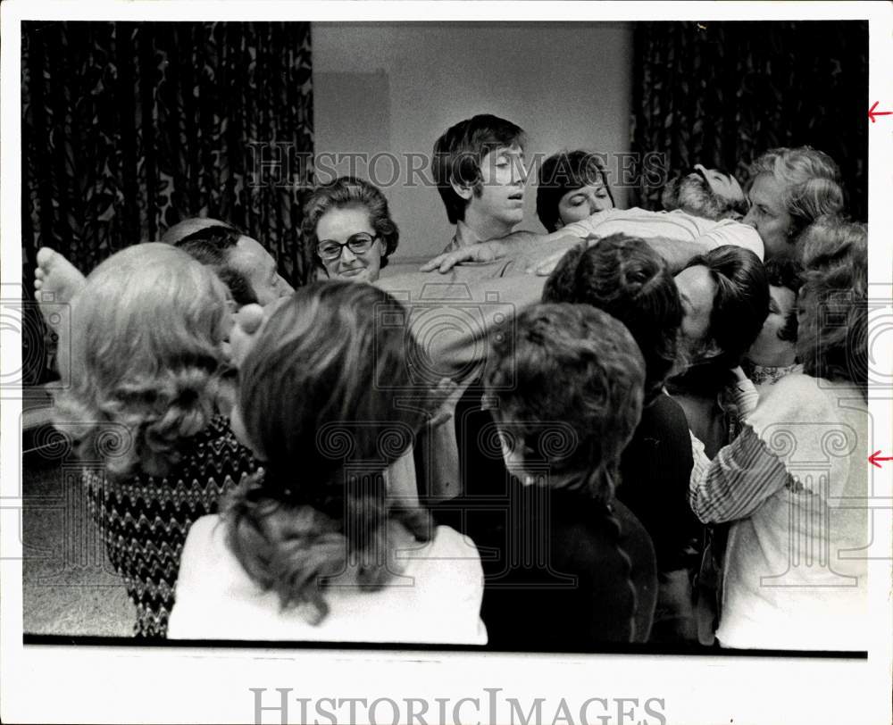 1973 Press Photo Friends lift Joe Stecker at Interface workshop. - hps11230- Historic Images