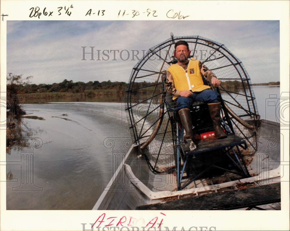 1992 Press Photo Ron Tolleson drives Air Boat, Trinity River Marsh near Baytown