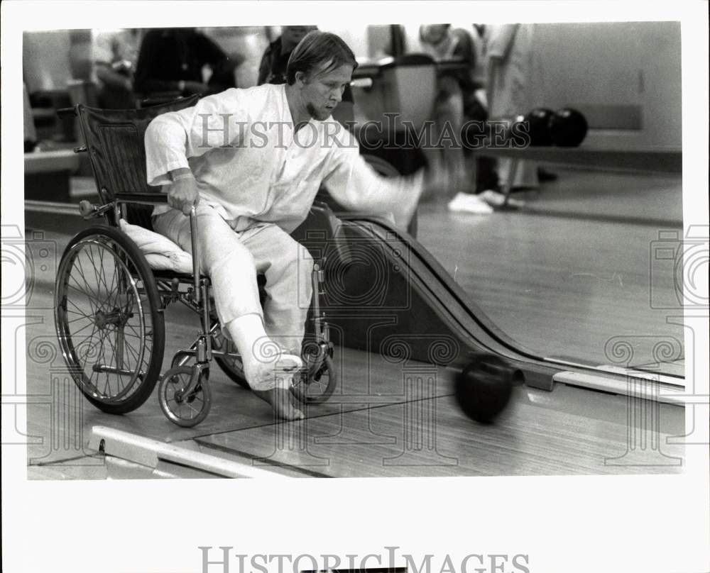 1976 Press Photo Man in Wheelchair Bowling - hps11367- Historic Images