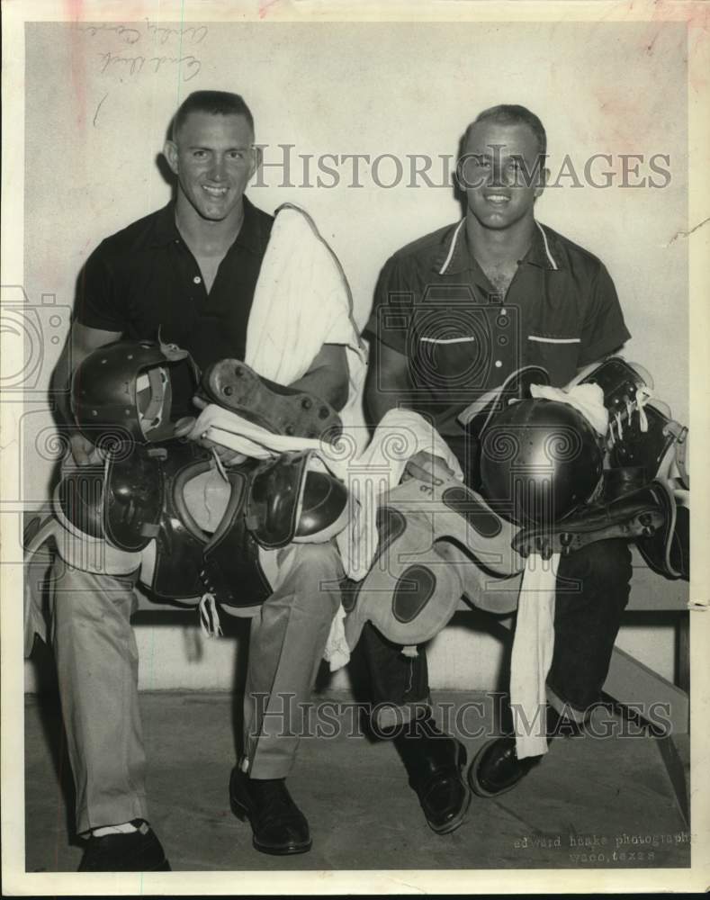 1959 Press Photo James Ray Smith and Wayne Culvahouse issued football equipment.- Historic Images