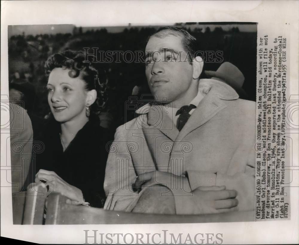 1955 Press Photo Boxer Carl (Bobo) Olson and Wife at Marciano-Cockell Fight- Historic Images