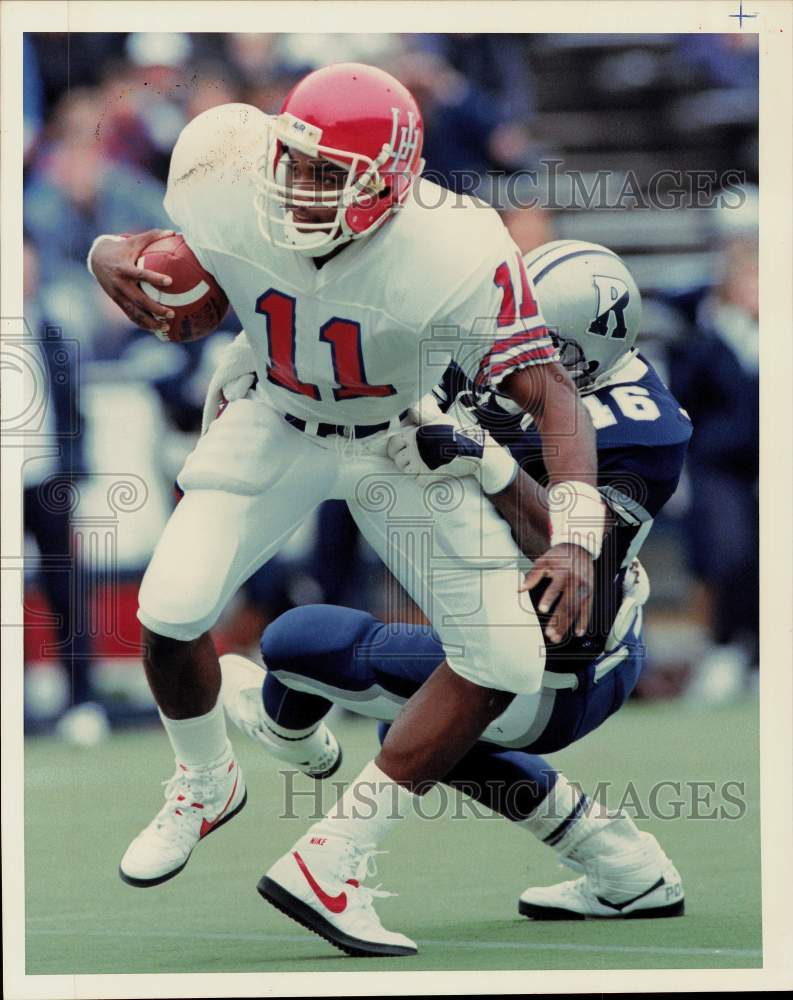 1989 Press Photo Andre Ware (Houston) and Alonzo Williams (Rice) play football- Historic Images