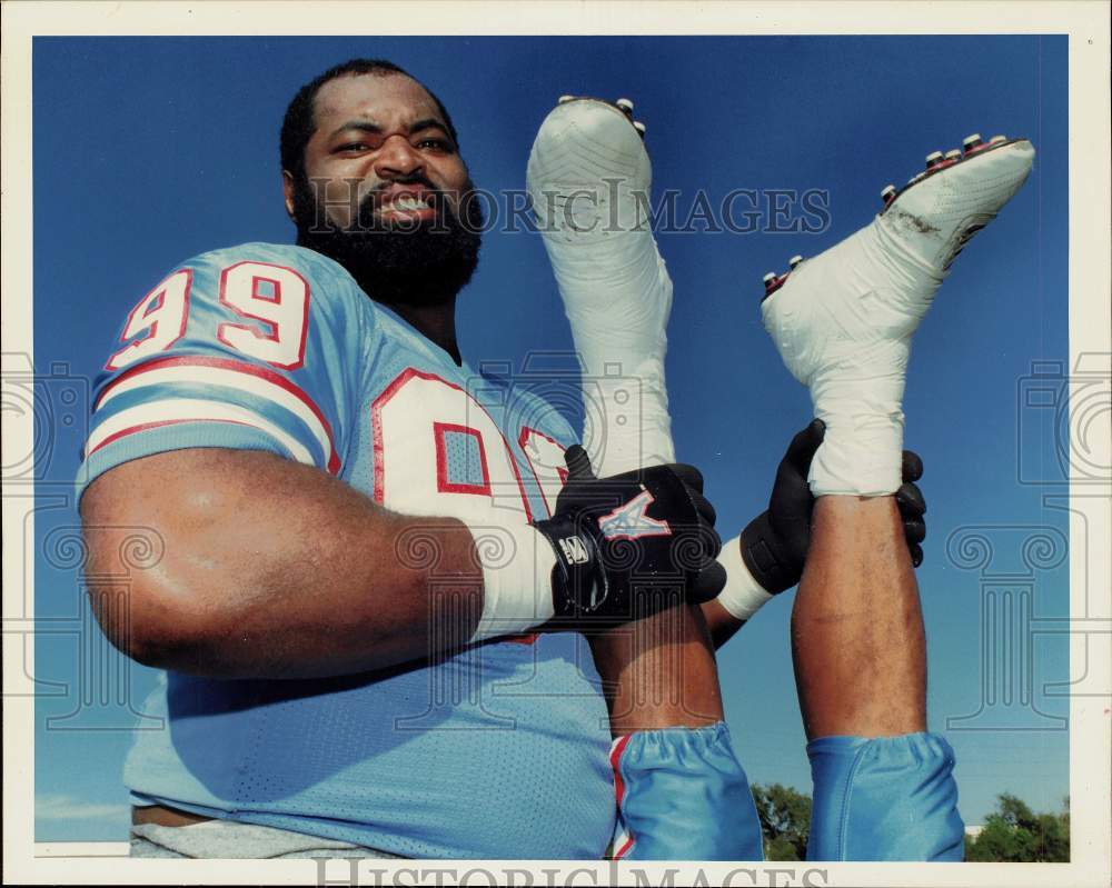 1989 Press Photo Houston Oilers Football Player Doug Smith Dangles Teammate- Historic Images