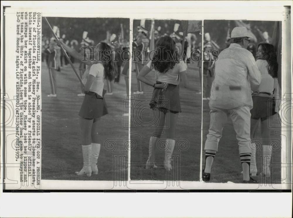 1975 Press Photo Ref helps Florida flag girl Missey Pressley in Jacksonville- Historic Images