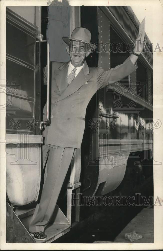 1956 Press Photo Baseball figure Dicke Kerr aboard a train - hps21771- Historic Images