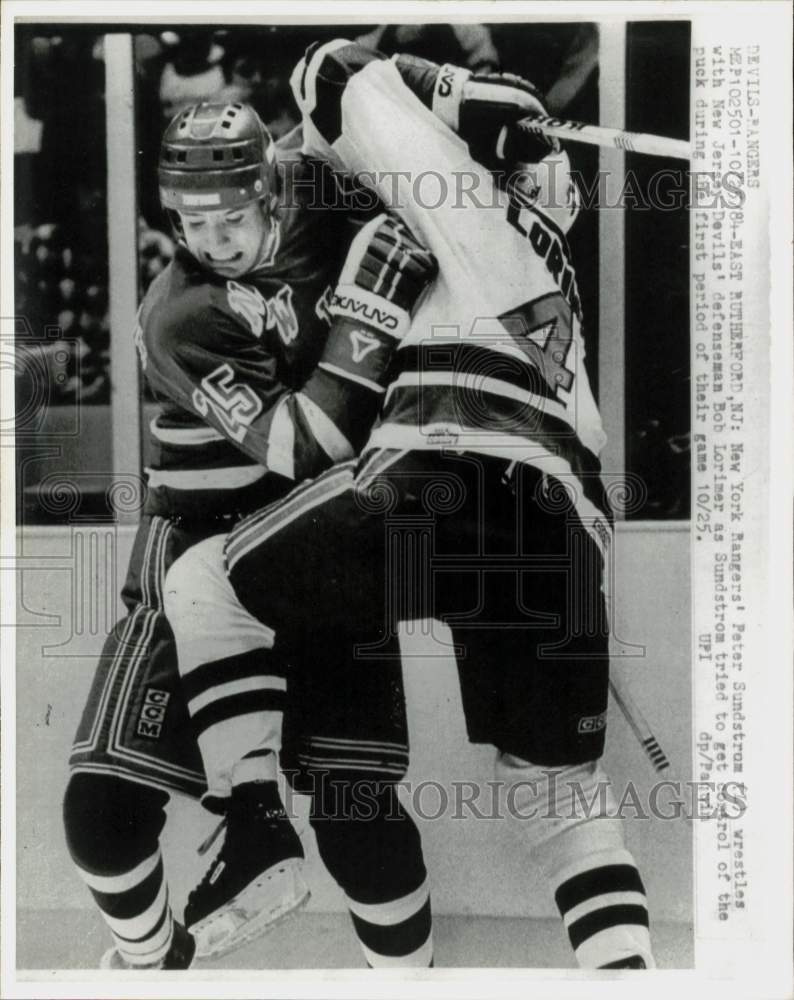 1984 Press Photo Peter Sundstrom/Bob Lorimer in Rangers/Devils Hockey Action, NJ- Historic Images