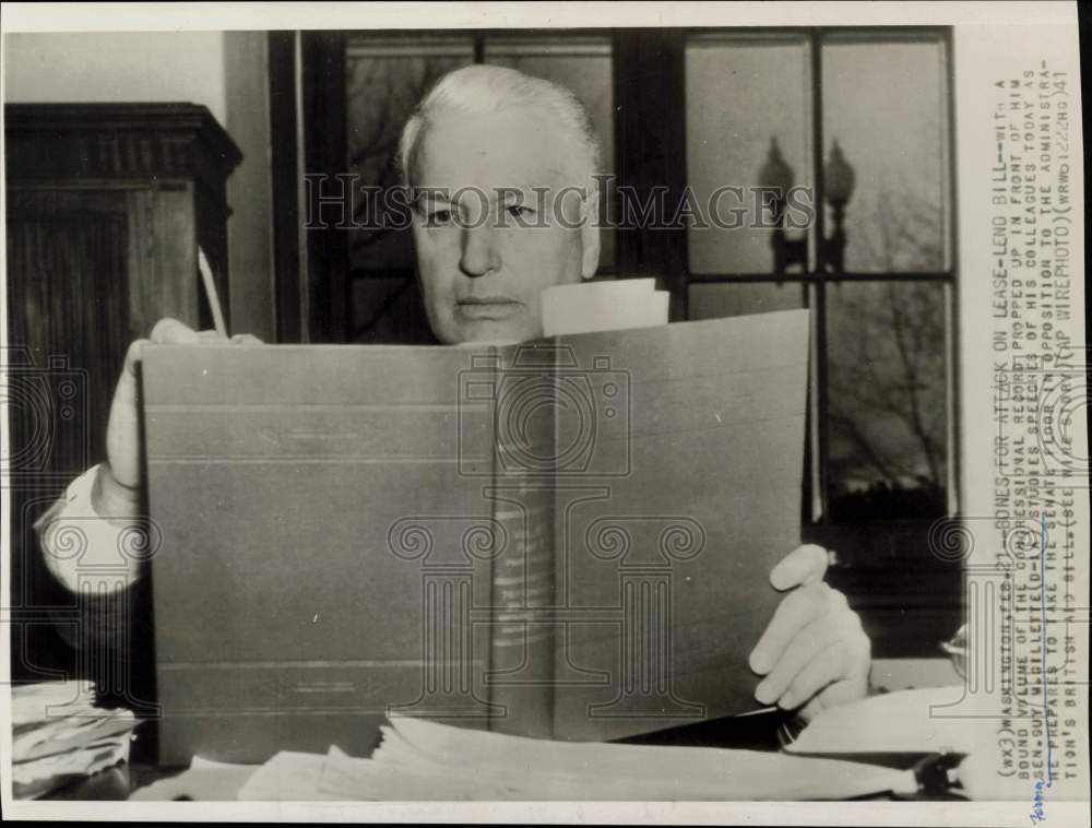 1941 Press Photo Senator Guy Gillette studies Congressional Record in D.C.- Historic Images