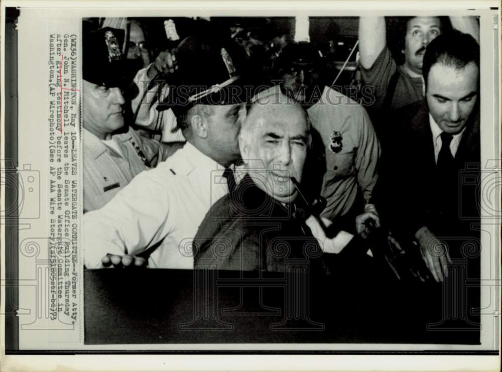 1973 Press Photo John Mitchell leaves Senate Office Building in Washington.