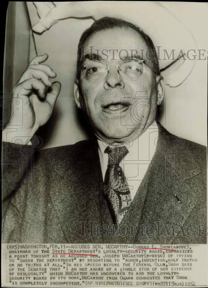 1952 Press Photo Conrad Snow makes statement at Washington's Federal Club.- Historic Images