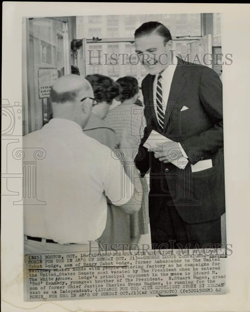 1962 Press Photo George Cabot Lodge greets people entering factory in Boston.- Historic Images