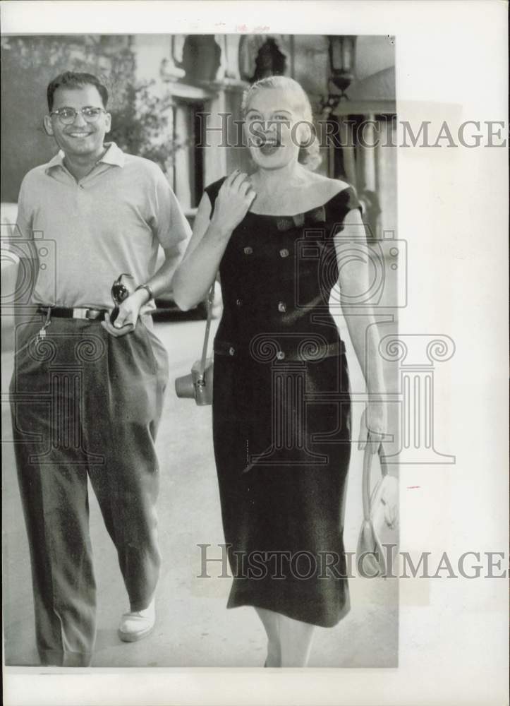 1956 Press Photo Bobo Rockefeller and Richard Brandt stroll streets of Venice.- Historic Images