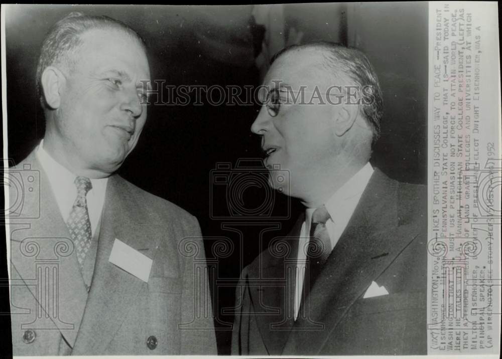 1952 Press Photo Milton Eisenhower and J.A. Hannah confer in Washington.- Historic Images