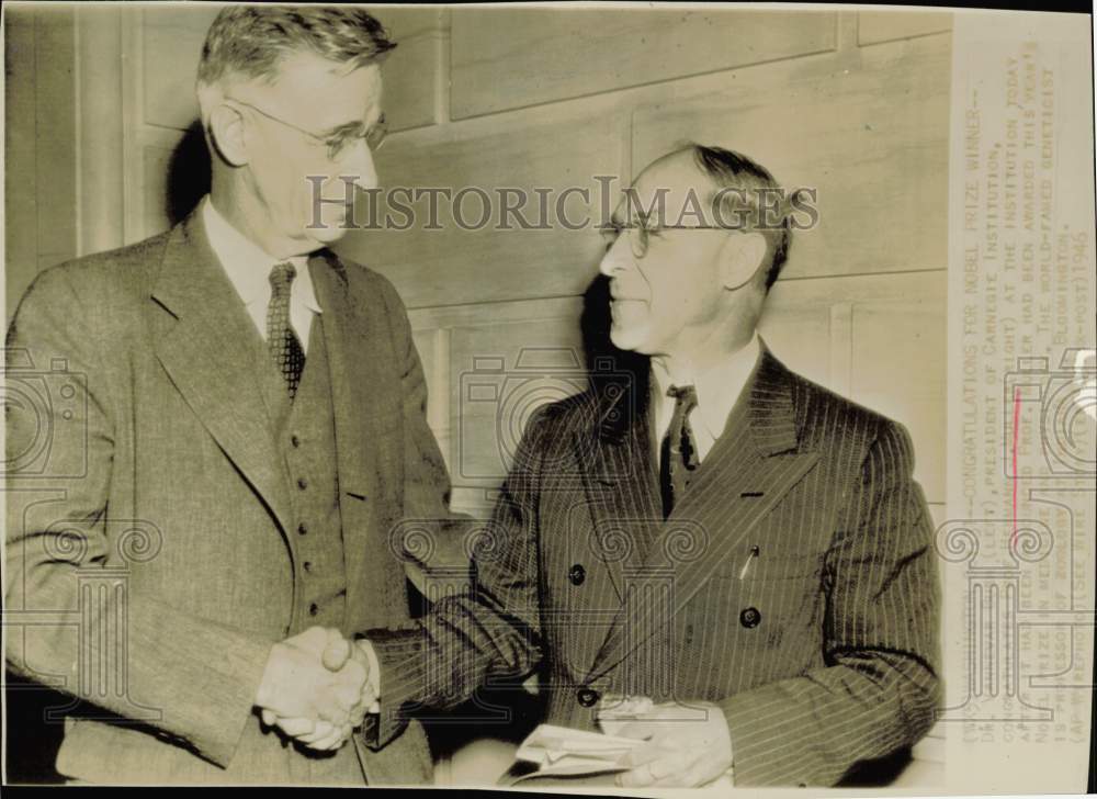 1946 Press Photo Hermann Mueller congratulated on Nobel Prize award. - hpw42052- Historic Images