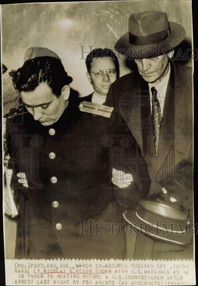 1956 Press Photo Lt. Nicolai Redin escorted by Marshals to U.S. Commissioner.- Historic Images