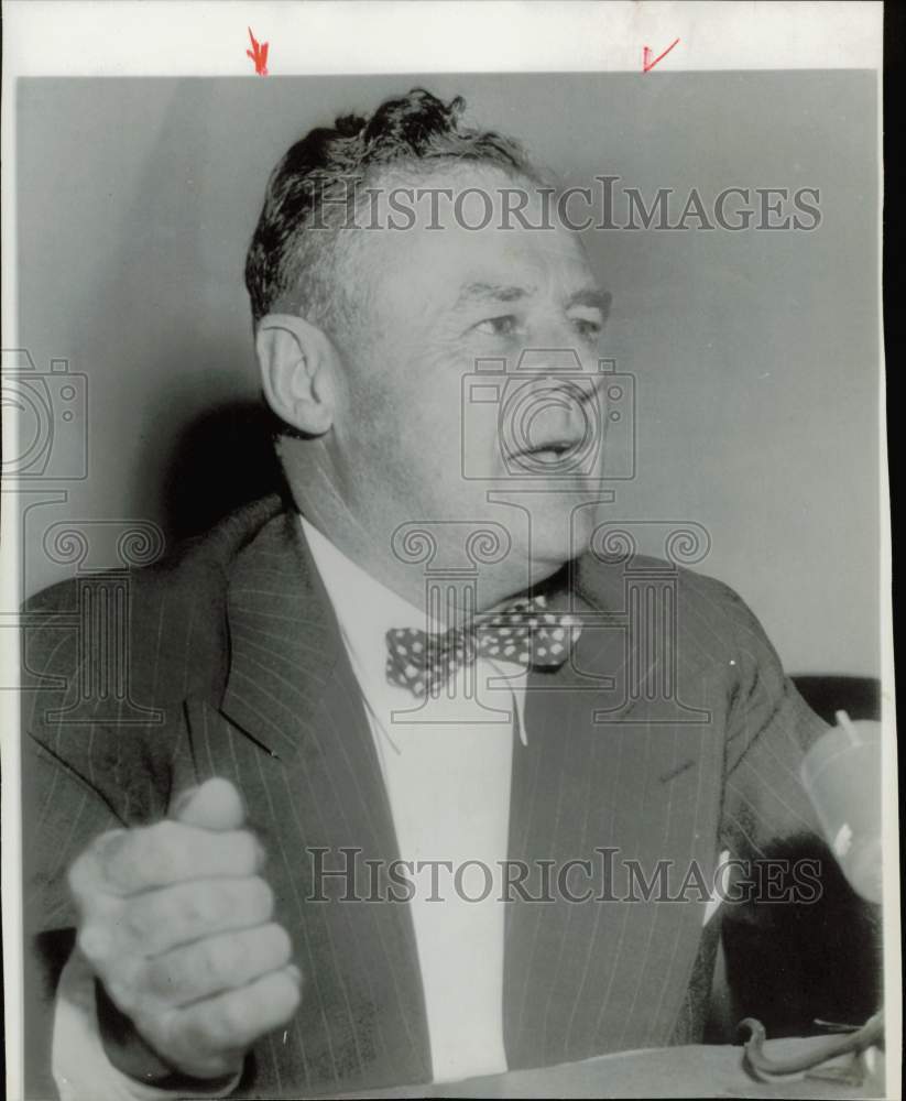 1956 Press Photo Roger Putnam, wage stabilizer, gestures - hpw43137- Historic Images