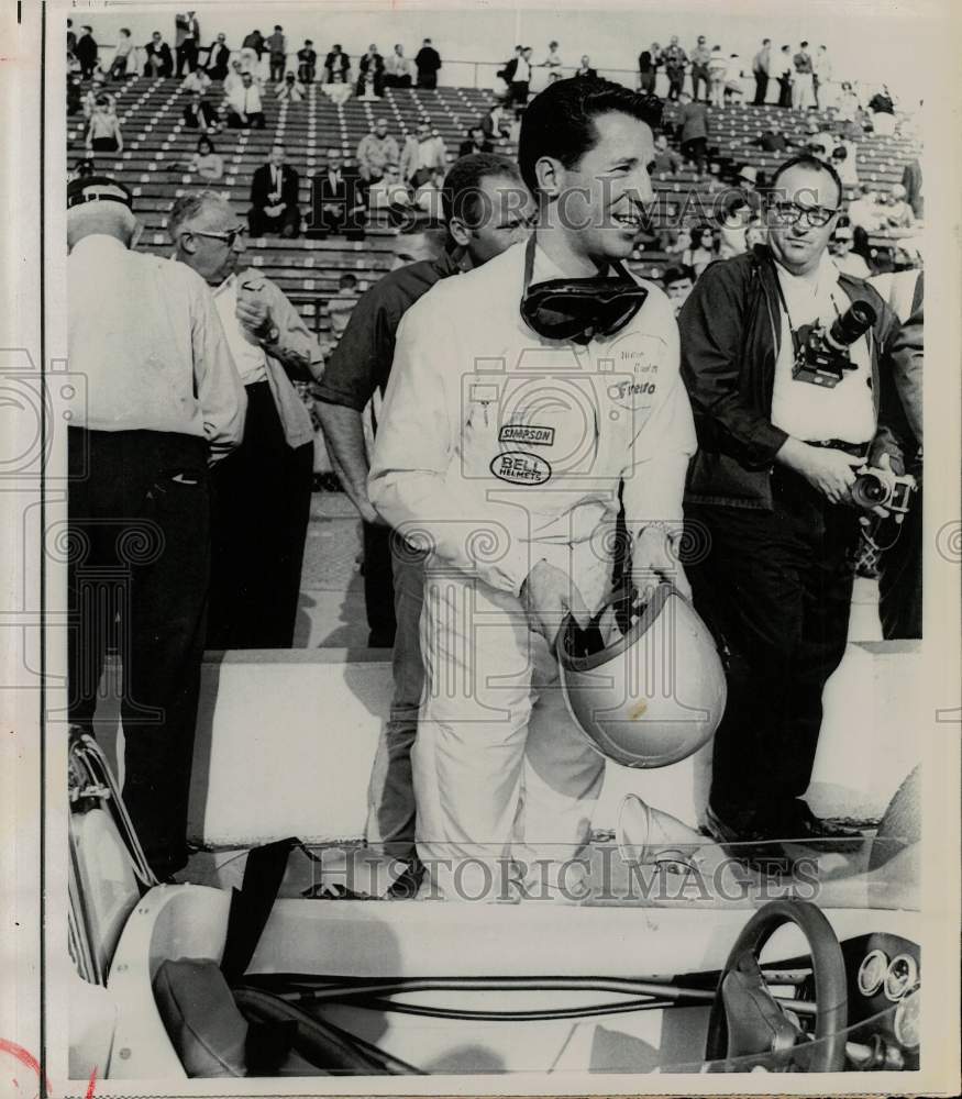 1967 Press Photo Mario Andretti after trial run at Indianapolis Motor Speedway- Historic Images