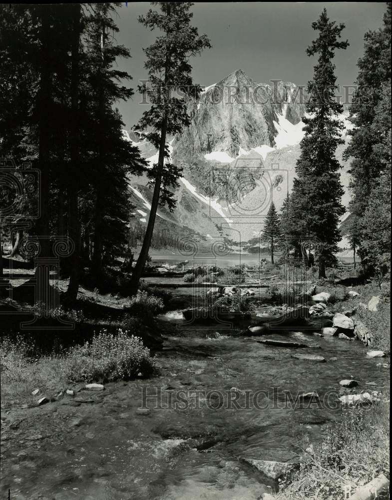 1970 Press Photo A stream with a view of snow-capped mountains in Colorado- Historic Images