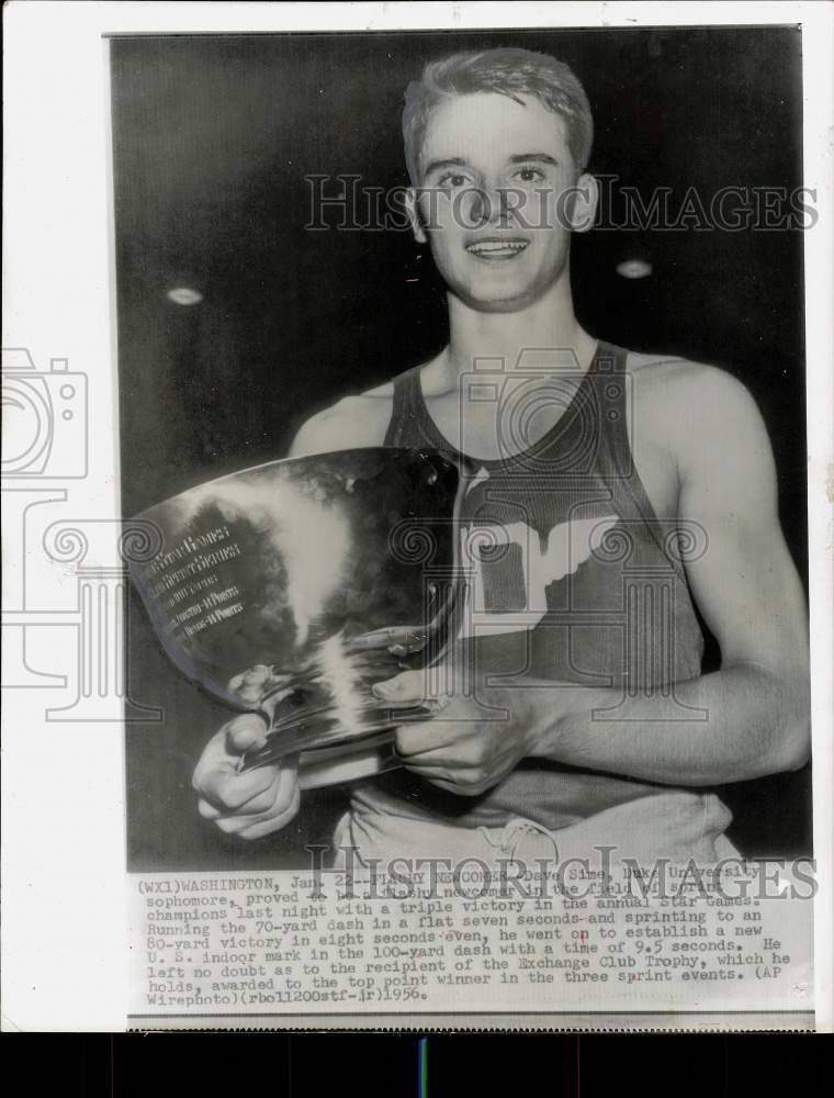 1956 Press Photo Sprinter Dave Sime holds trophy after wins at Washington games- Historic Images