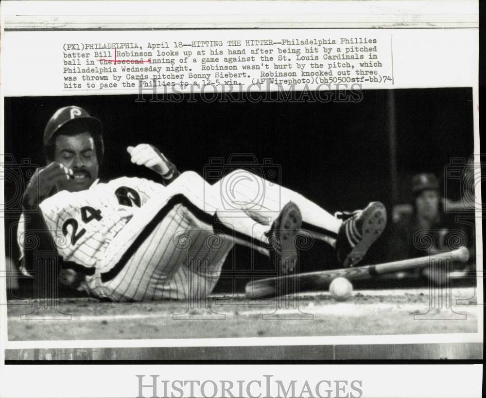 1974 Press Photo Phillies batter Bill Robinson hit by ball at Philadelphia game- Historic Images