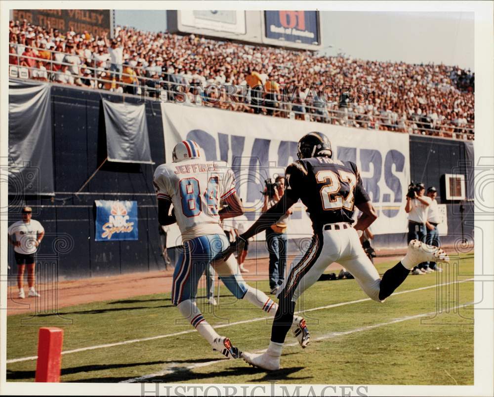 1993 Press Photo Oilers football star Haywood Jeffires trailed by Donald Frank- Historic Images