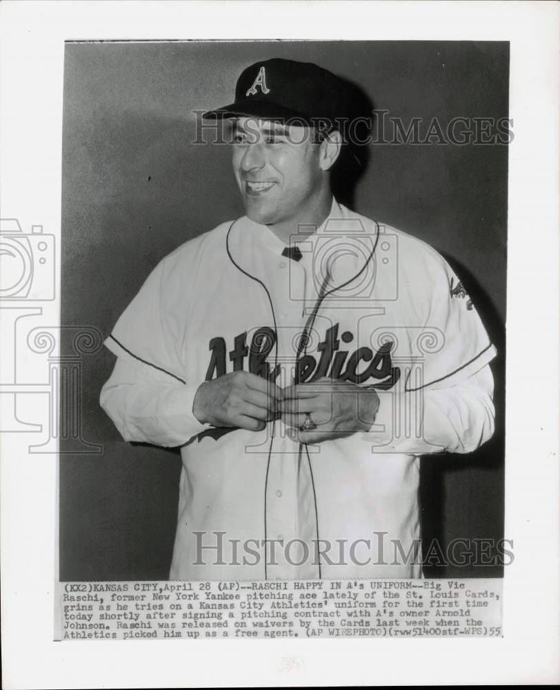 1955 Press Photo New Kansas City A&#39;s baseball pitcher Vic Raschi tries uniform- Historic Images