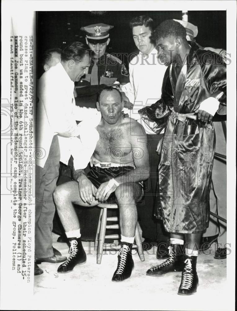 1957 Press Photo Pete Rademacher sits down after boxing bout vs. Floyd Patterson- Historic Images