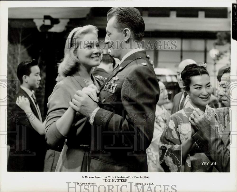 1958 Press Photo May Britt and Robert Mitchum in scene from "The Hunters."- Historic Images