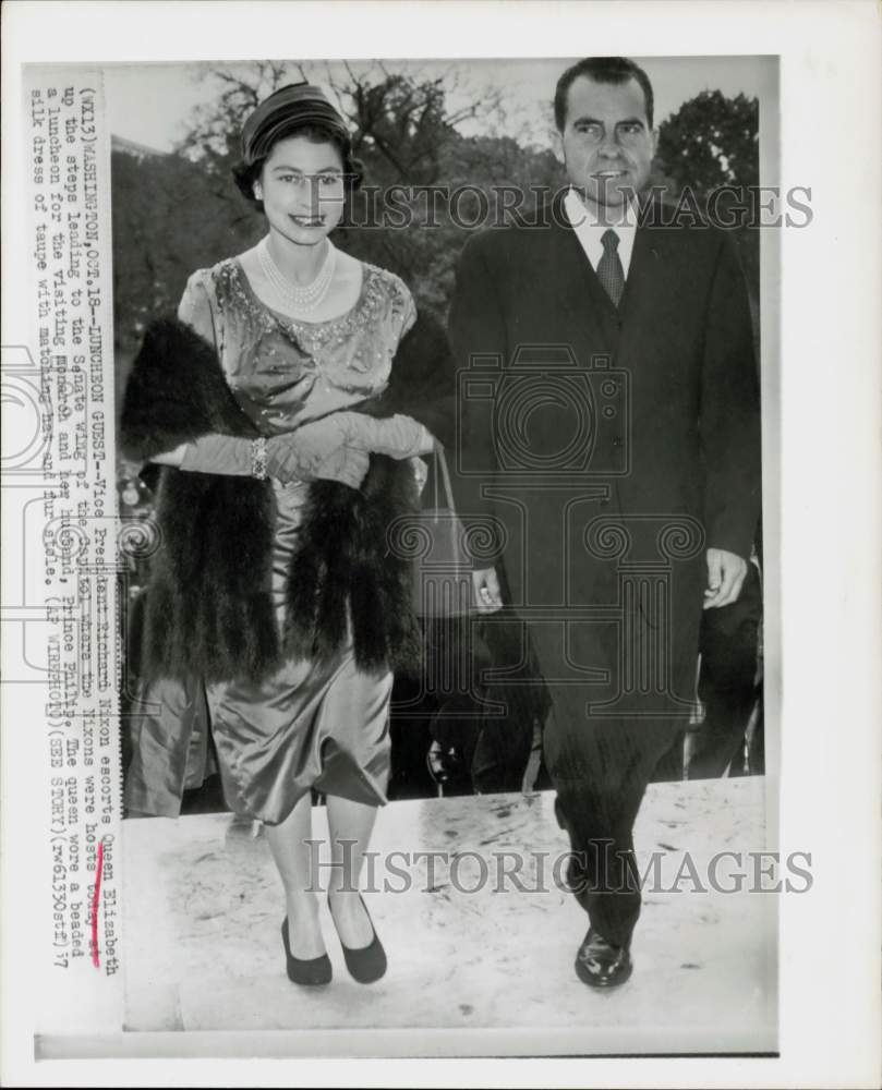 1957 Press Photo Queen Elizabeth escorted by Richard Nixon to Capitol luncheon.- Historic Images