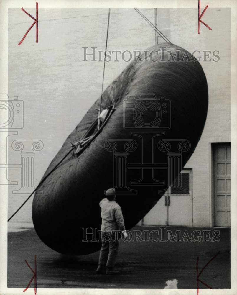 1970 Press Photo B.F. Goodrich experimental carcass hoisted at plant site.- Historic Images