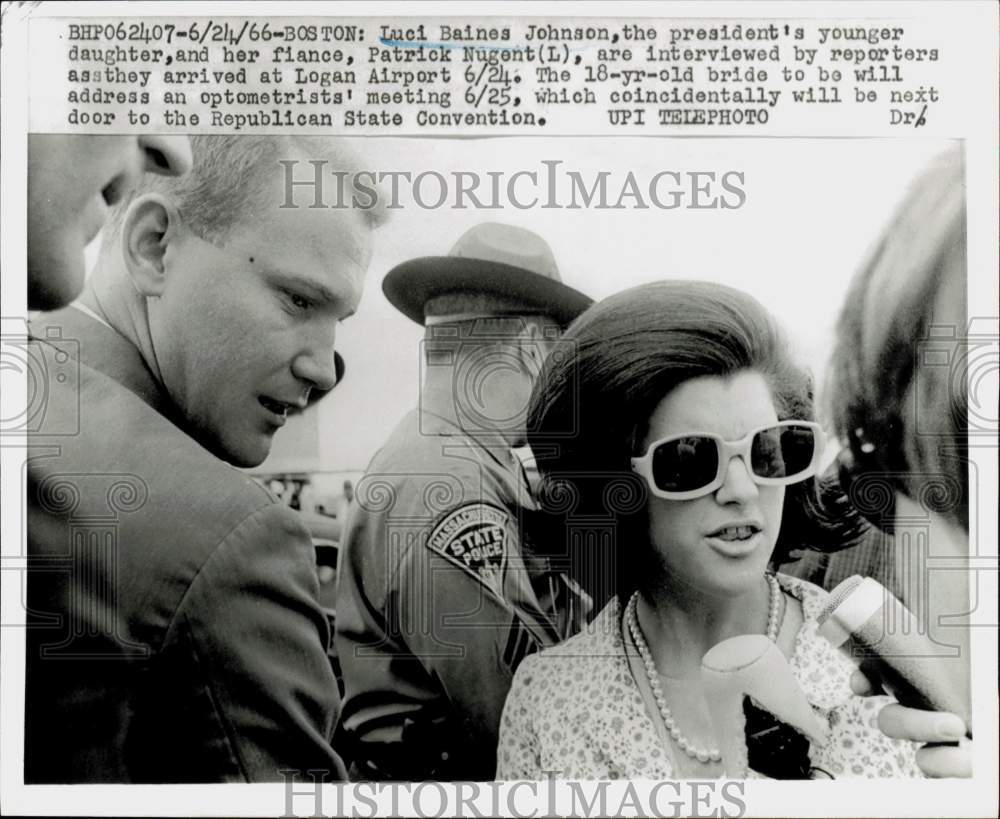 1966 Press Photo Luci Johnson and fiance Pat Nugent talk with press in Boston.- Historic Images