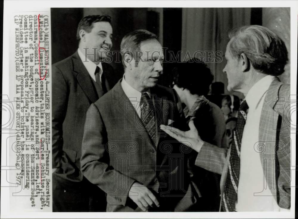 1977 Press Photo Michael Blumenthal talks with Charles Schultze in Washington- Historic Images