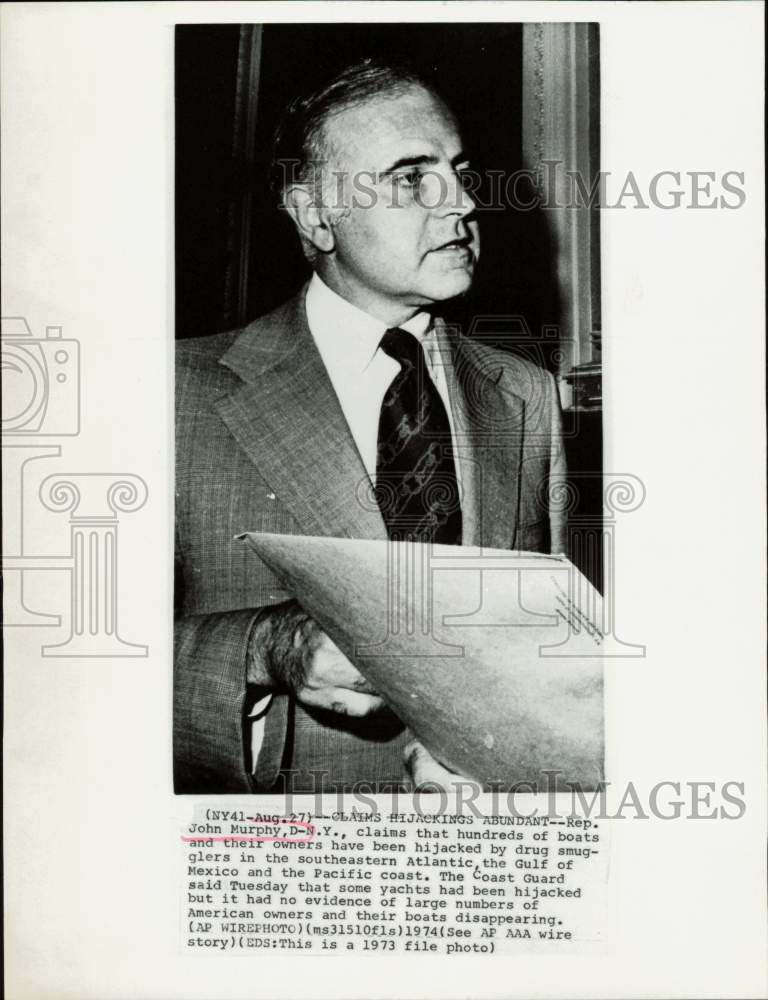 1973 Press Photo Representative John Murphy showing a document - kfa28366- Historic Images