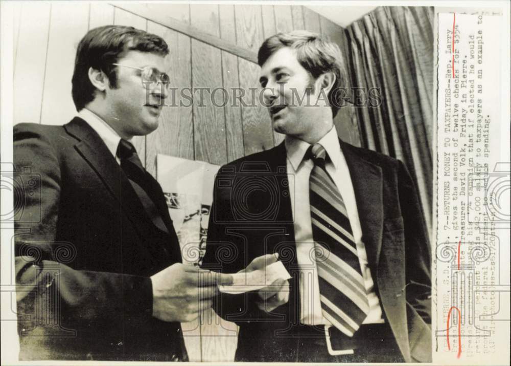 1975 Press Photo Larry Pressler gives checks to David Volk in South Dakota- Historic Images