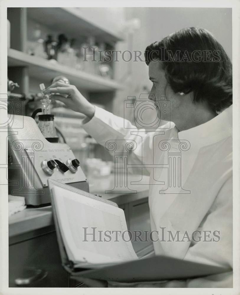 Press Photo Flame Photometer Is Used by Scientist at American Cyanamid Company- Historic Images