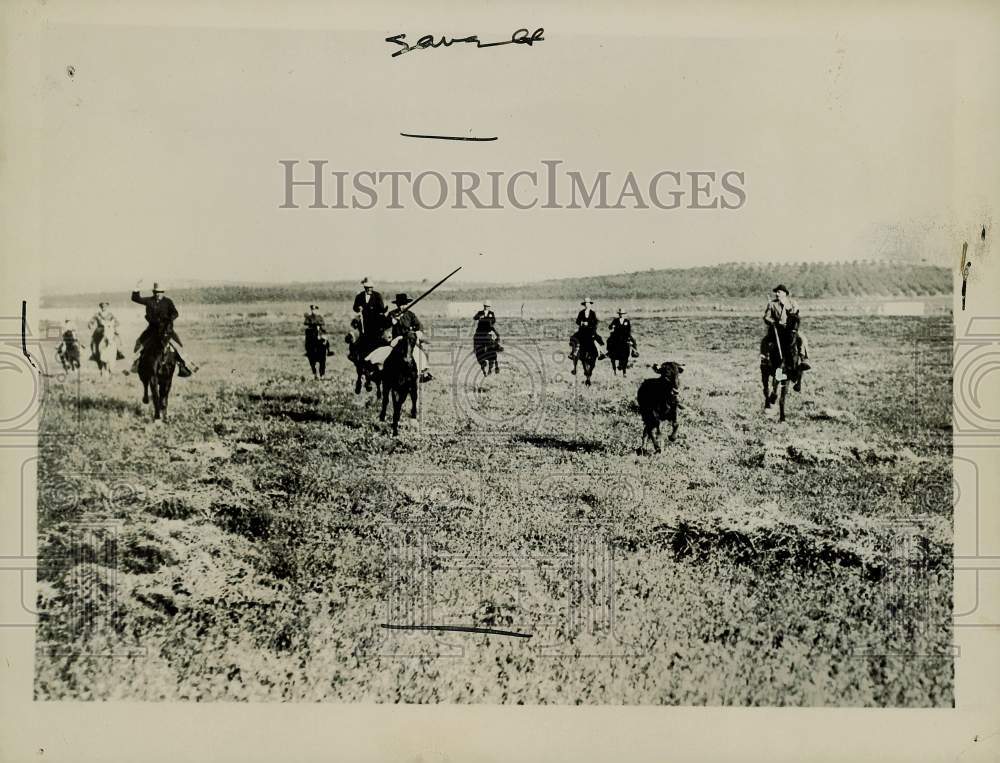 1926 Press Photo Society Members Chasing Bull in Spain - kfx29087- Historic Images