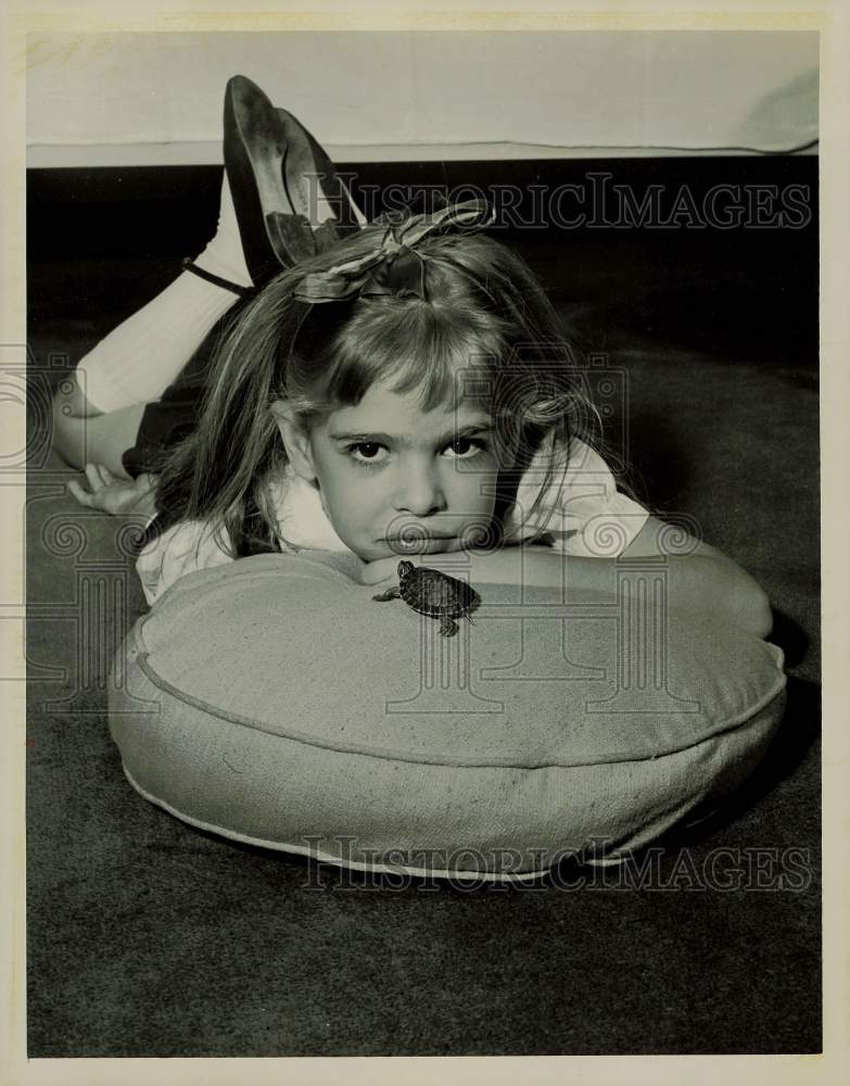 1956 Press Photo Young Girl with Baby Turtle on Pillow - kfx30178- Historic Images