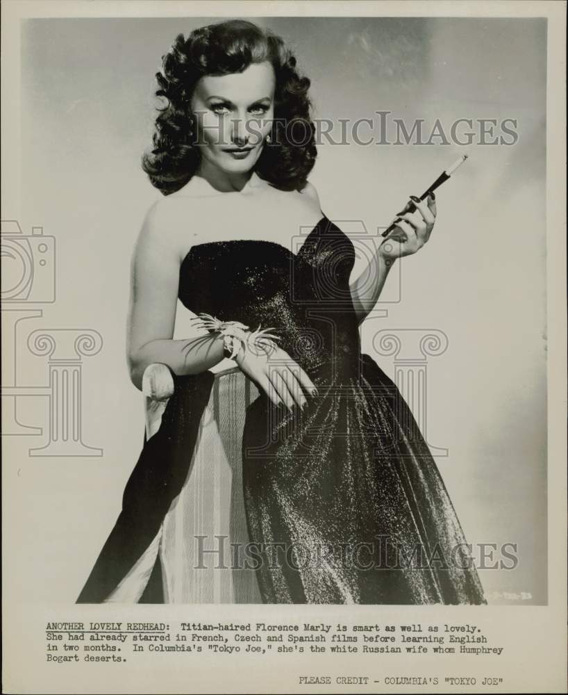 1949 Press Photo Florence Marly holding a cigarette in &quot;Tokyo Joe&quot; - kfx45311- Historic Images