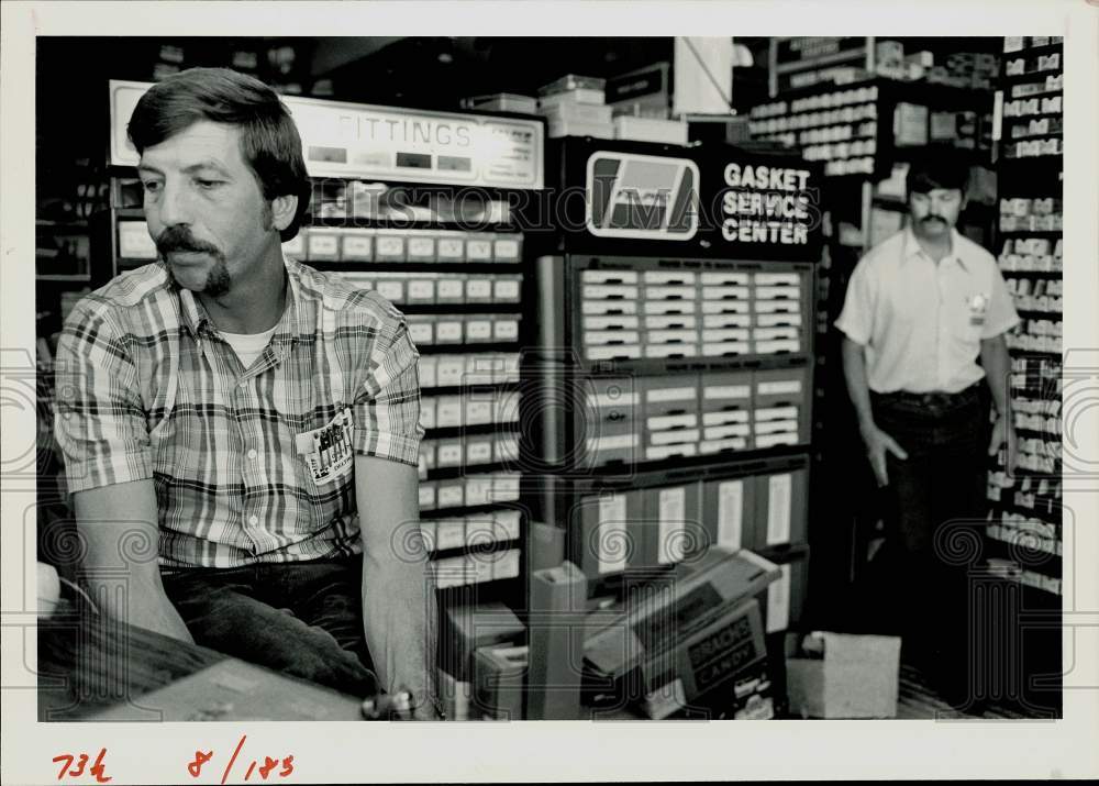 1984 Press Photo Larry Polich &amp; brother Joe at their auto supply store in Craig- Historic Images