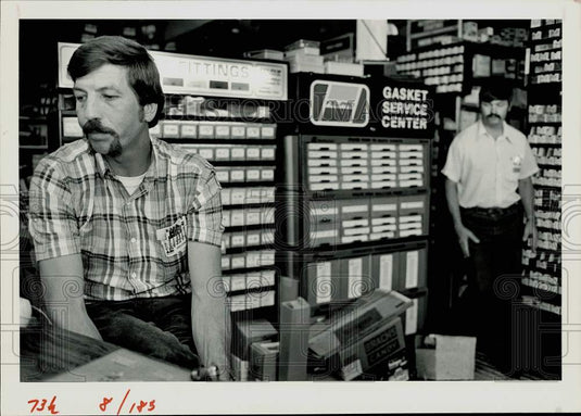 1984 Press Photo Larry Polich & brother Joe at their auto supply store in Craig- Historic Images
