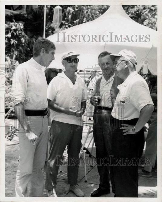 Press Photo Businessman William Lear chats with colleagues at informal event- Historic Images