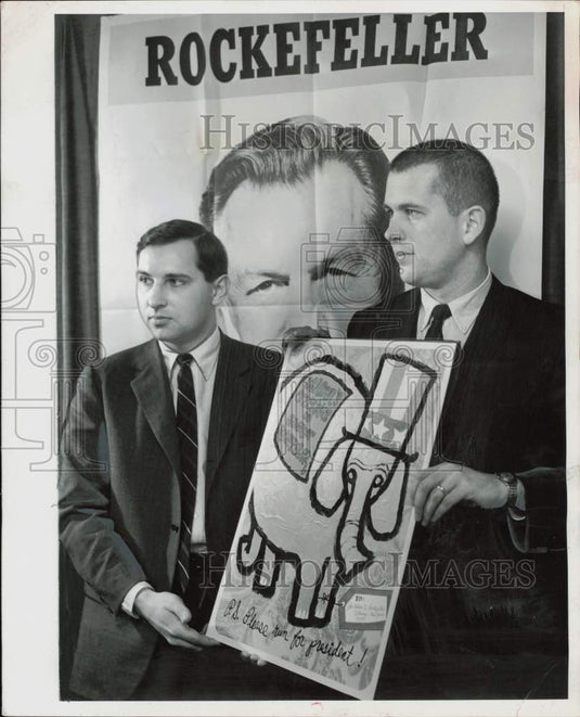 1967 Press Photo Paul Schell and George Akers hold card for Nelson Rockefeller- Historic Images