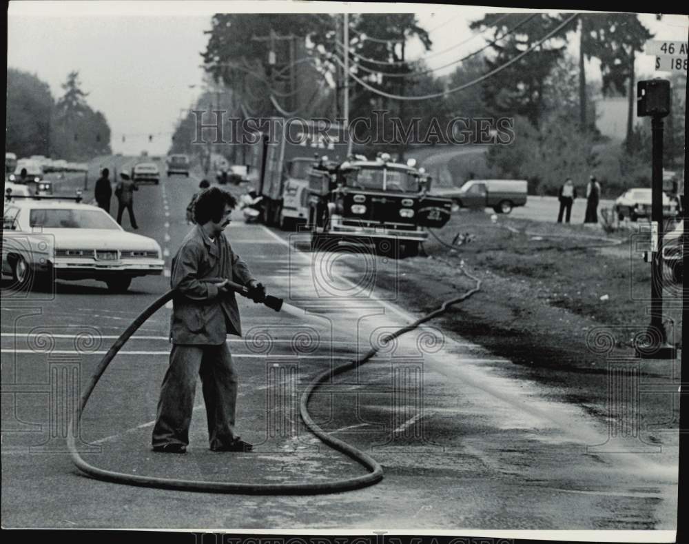 1979 Press Photo Toxic Chemicals Cleaned from Road After Car Accident- Historic Images