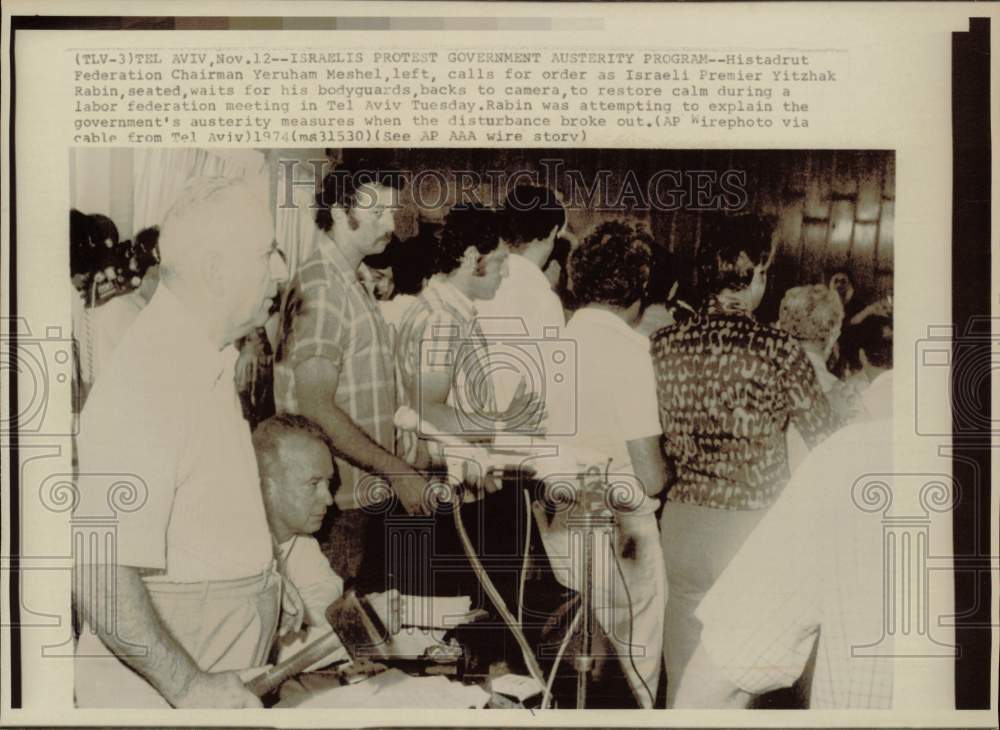 1974 Press Photo Premier Yitzhak Rabin waits for bodyguards as Israelis protest- Historic Images