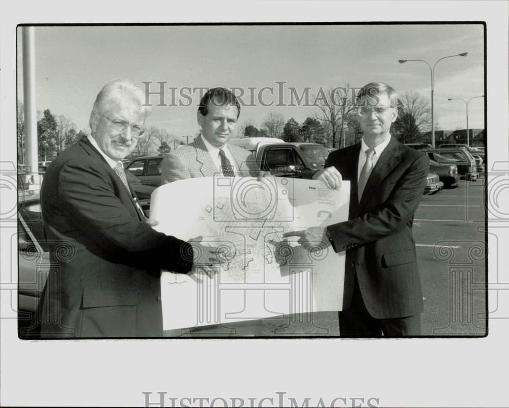 1991 Press Photo Officials look over plans for expansion of Cabarrus Hospital- Historic Images