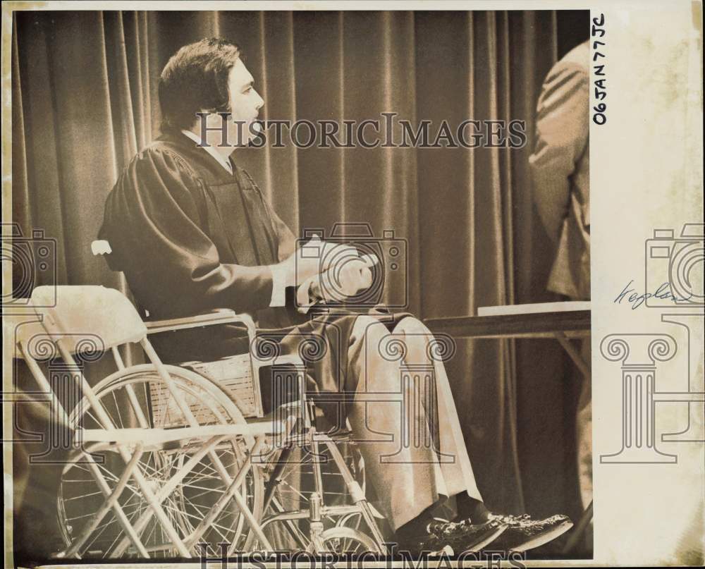 1977 Press Photo Man in wheelchair listens intently at an event - lra56786- Historic Images