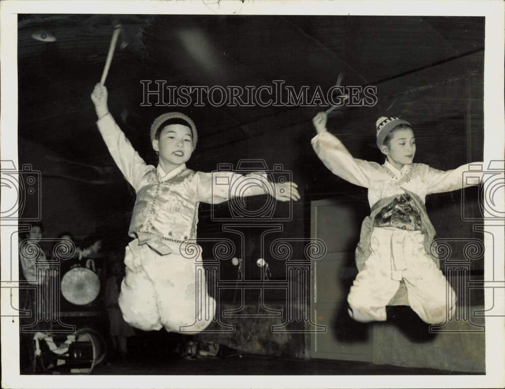 1957 Press Photo Young Korean dancers leap during performance - lra57004- Historic Images