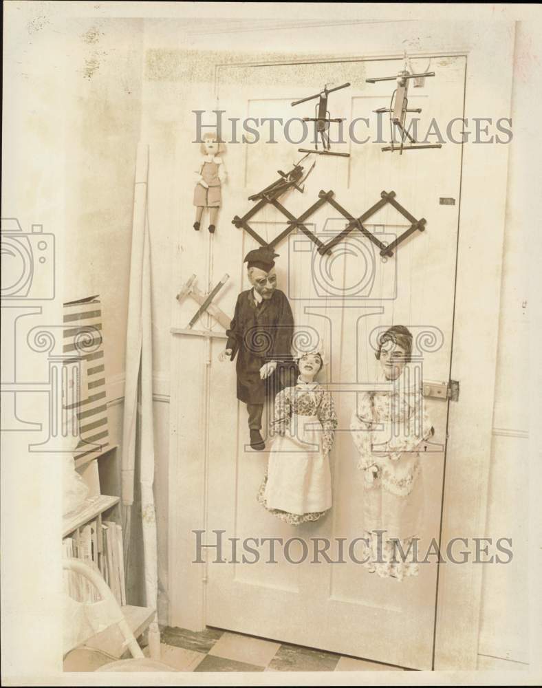 1976 Press Photo Puppets hanging on the door at Mint Museum - lra64142- Historic Images